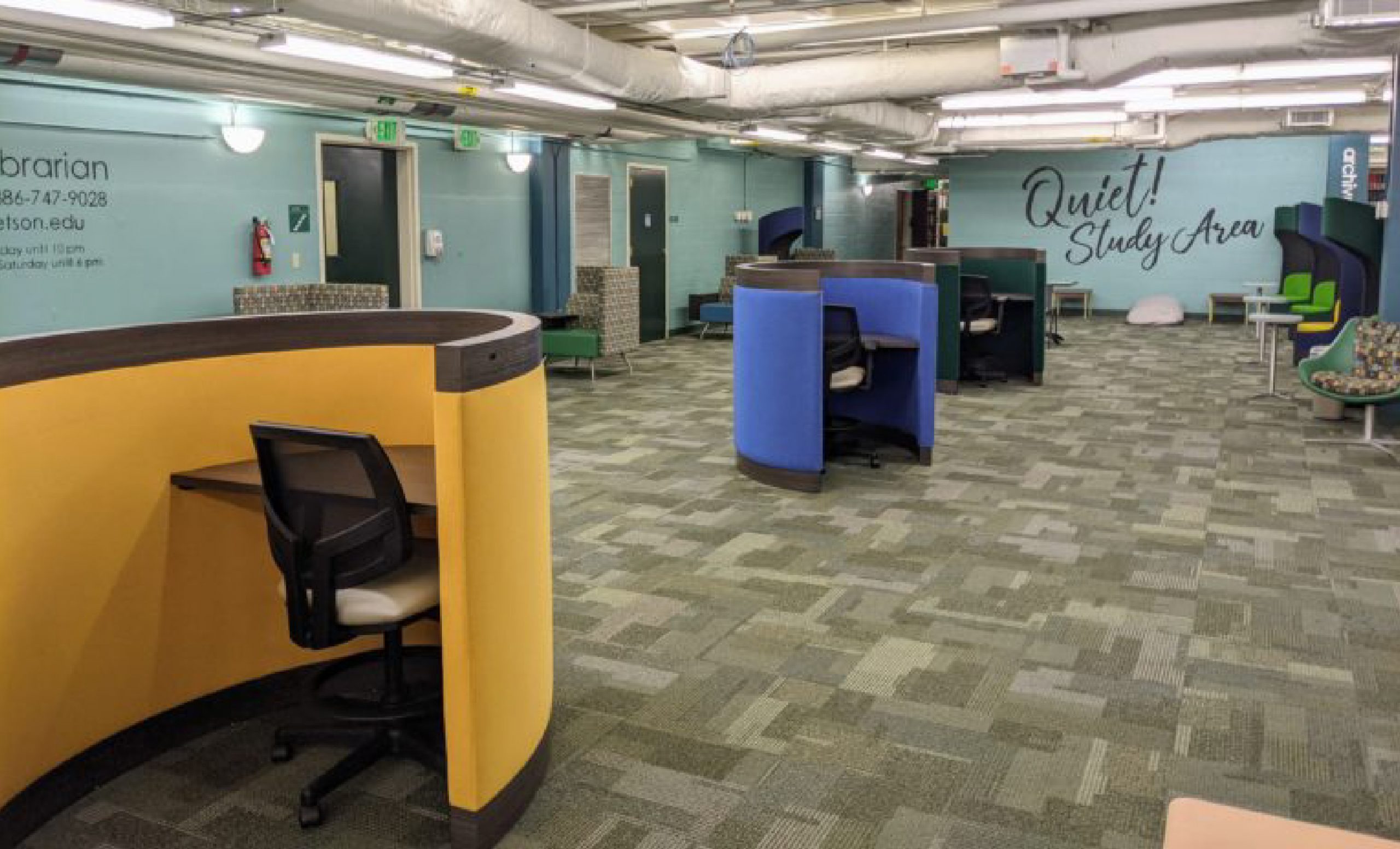 private work pods with built-in desks stetson library